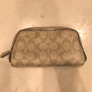 Coach gold clutch/makeup bag